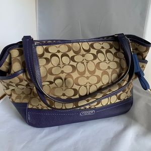 Coach signature “Carrie” canvas & leather tote